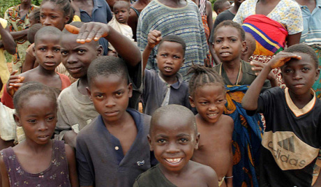 Liberian children in a community in Monrovia in a joyous mood watching students parading through the capital Monrovia,  in comemoration of the day of the African Child